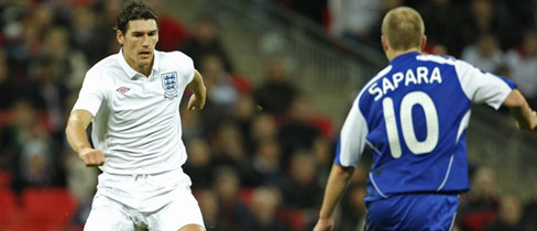 Gareth Barry in full flight against Slovakia at Wembley Stadium.